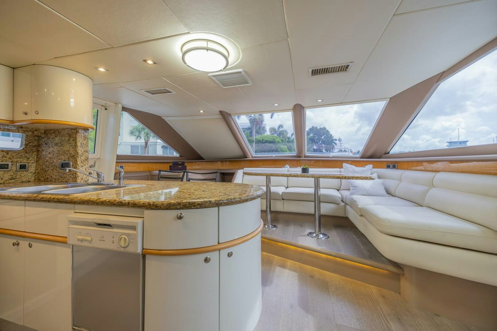 a kitchen with a large island aboard BOURBON LEGEND Yacht for Sale