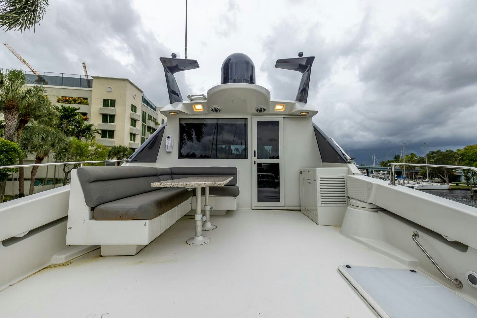 a white machine on a deck aboard BOURBON LEGEND Yacht for Sale