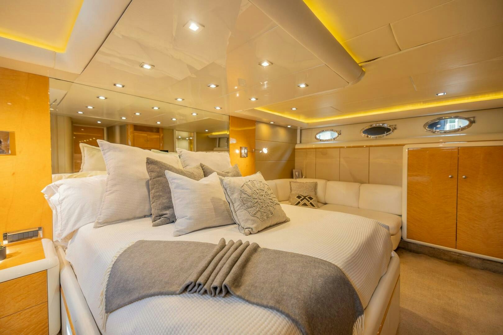 a large bed in a room aboard BOURBON LEGEND Yacht for Sale