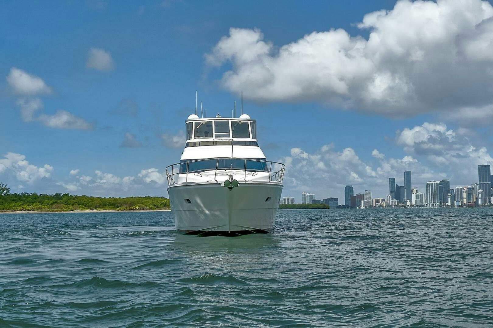 a white boat in the water aboard DREAM Yacht for Sale