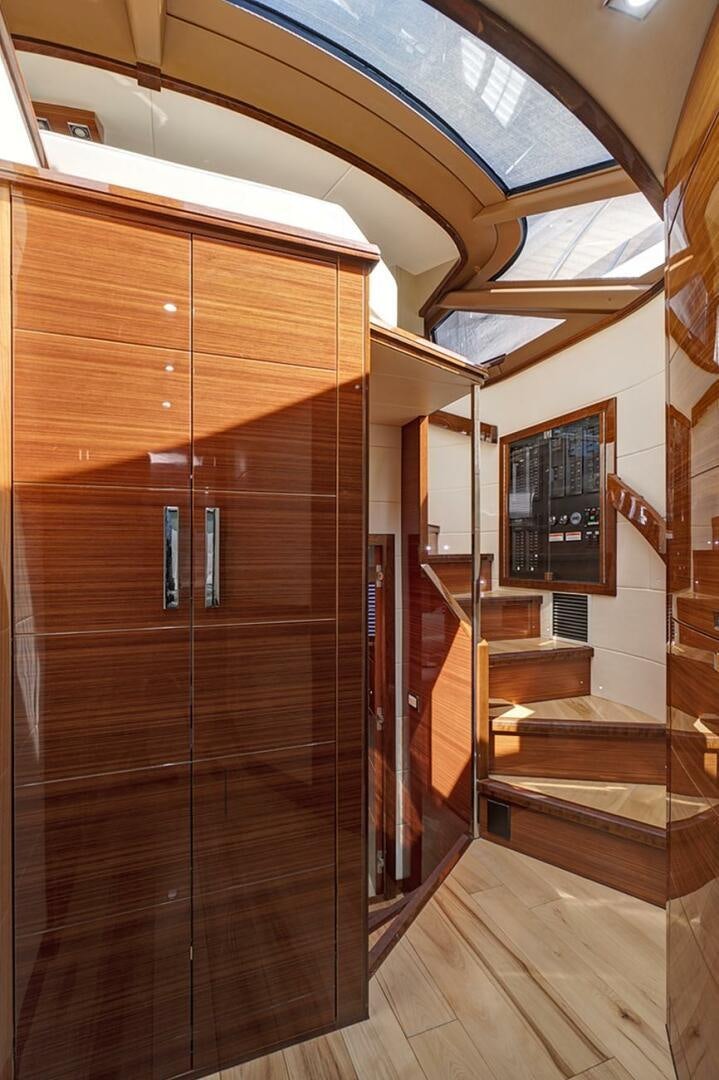a wooden closet in a house aboard DREAM Yacht for Sale
