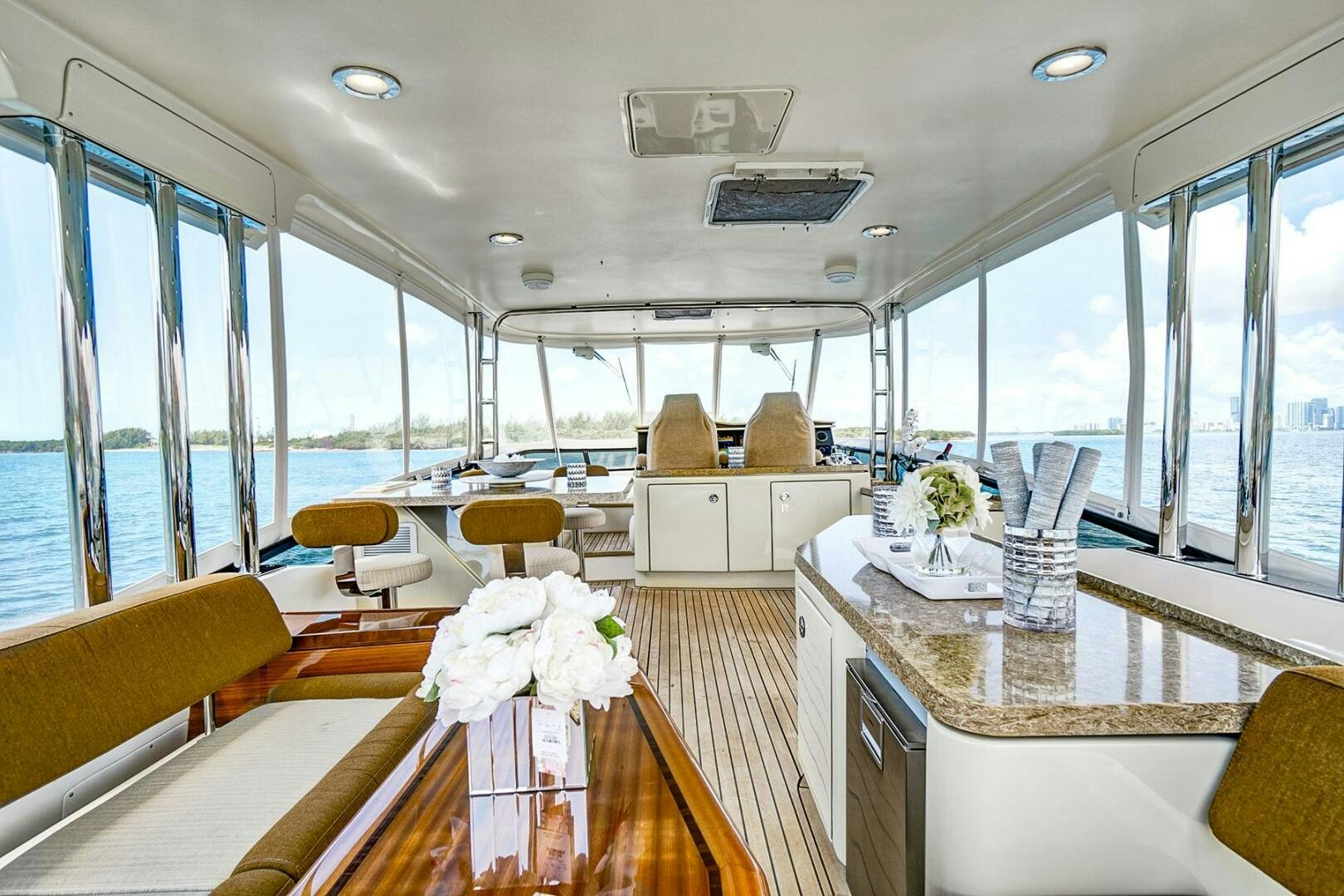 inside of a building with a table and chairs aboard DREAM Yacht for Sale