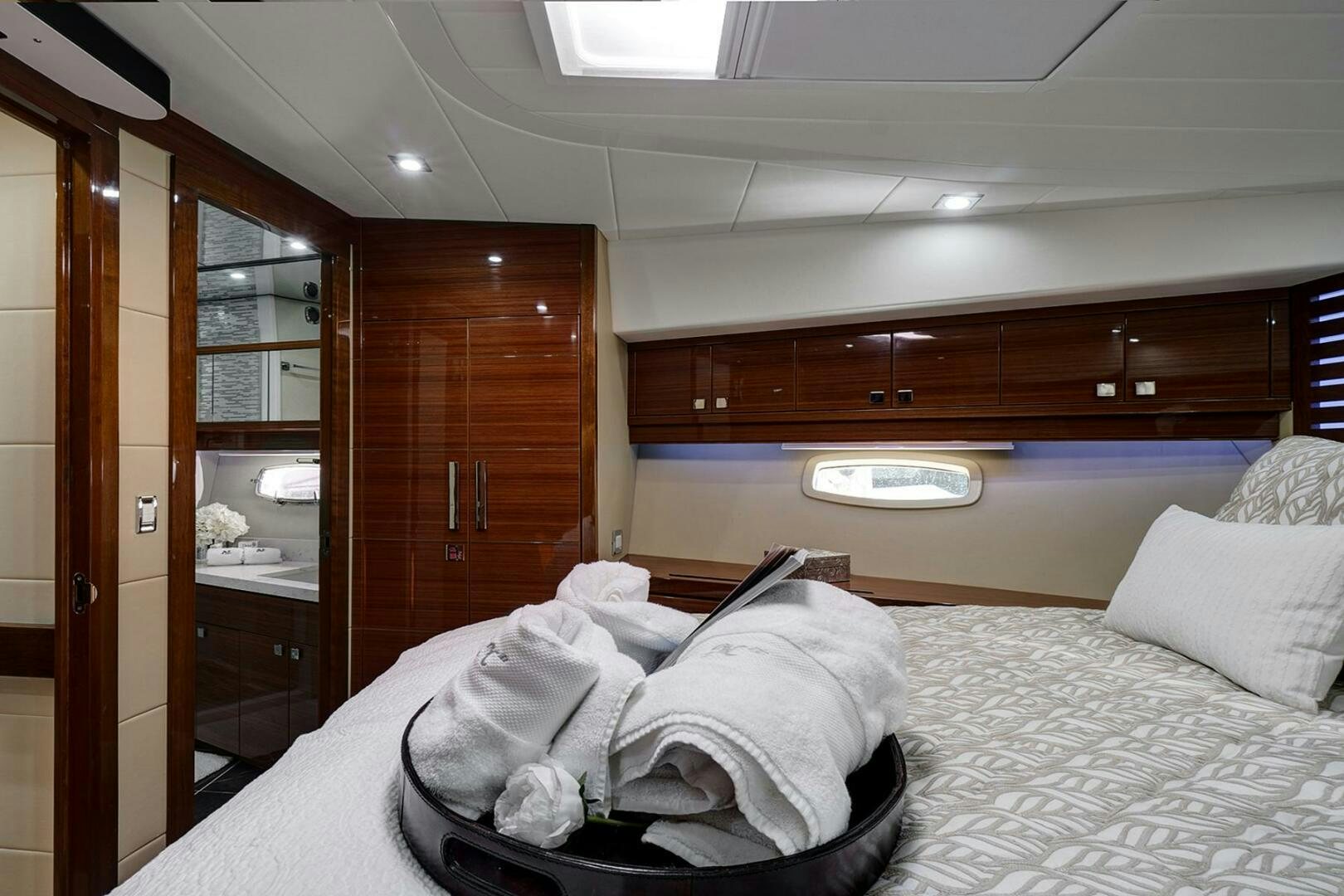 a bed in a room aboard DREAM Yacht for Sale
