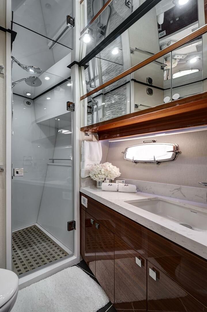 a bathroom with a sink and a mirror aboard DREAM Yacht for Sale
