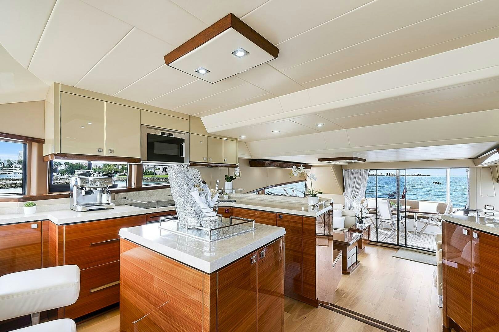 a kitchen with a large window aboard DREAM Yacht for Sale