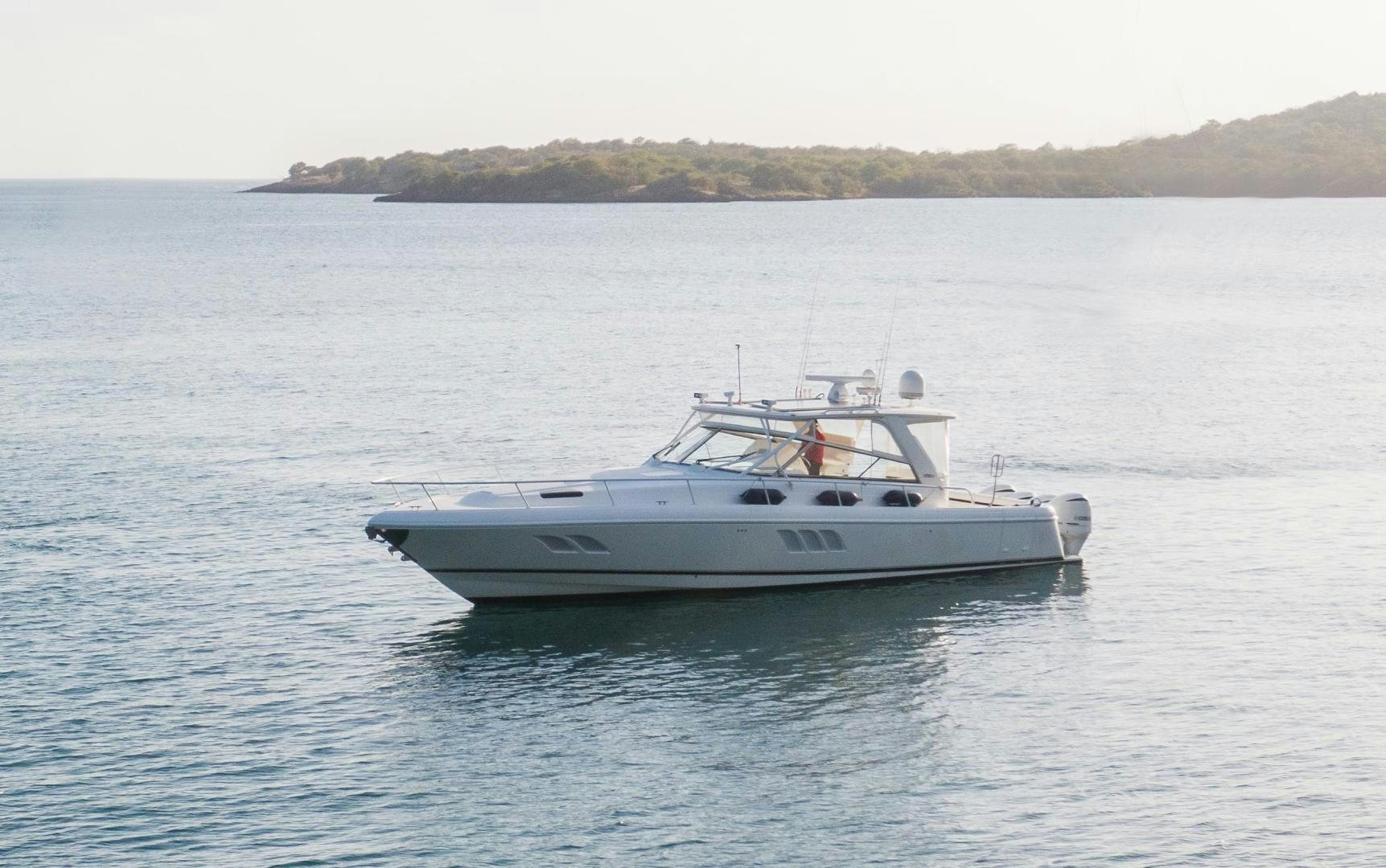 a boat on the water aboard Forget about it. Yacht for Sale