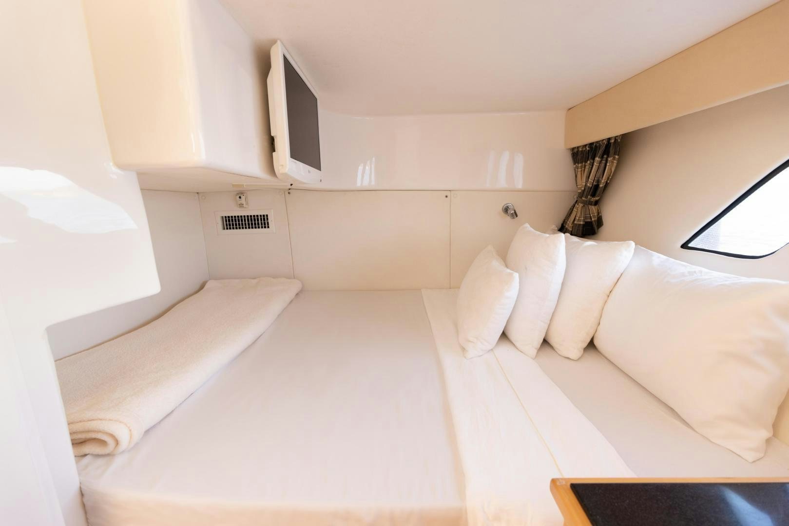 a room with two beds aboard Forget about it. Yacht for Sale