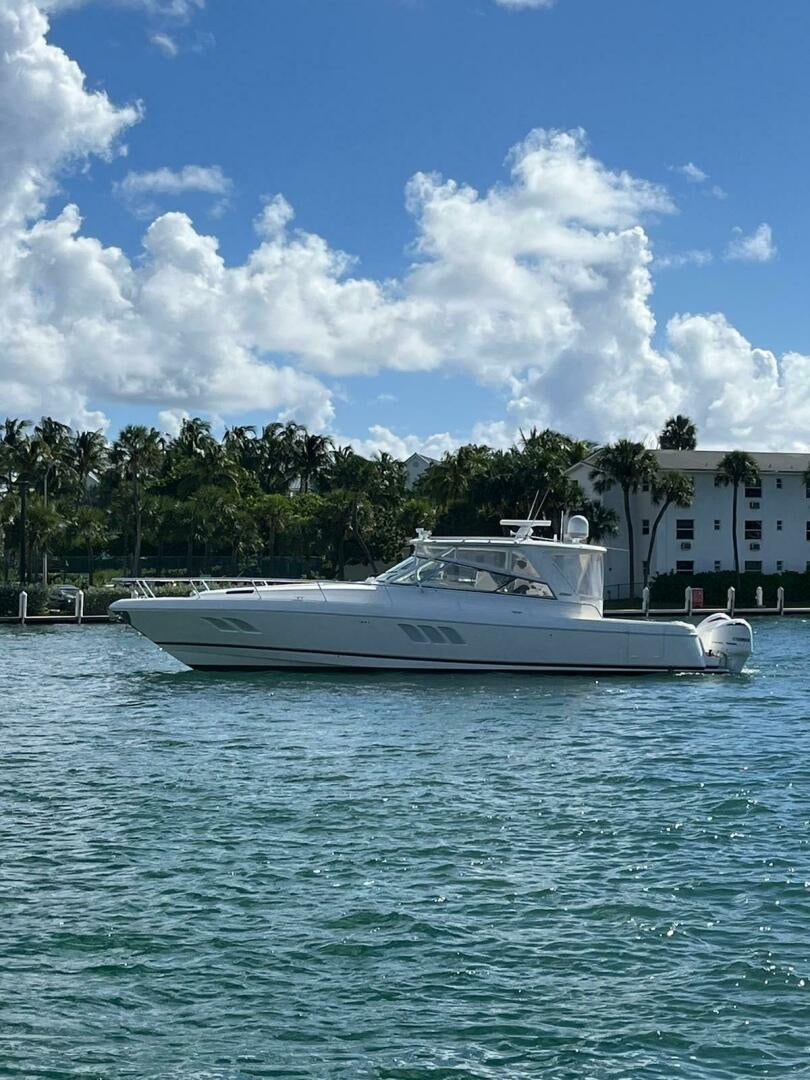 a boat in the water aboard Forget about it. Yacht for Sale