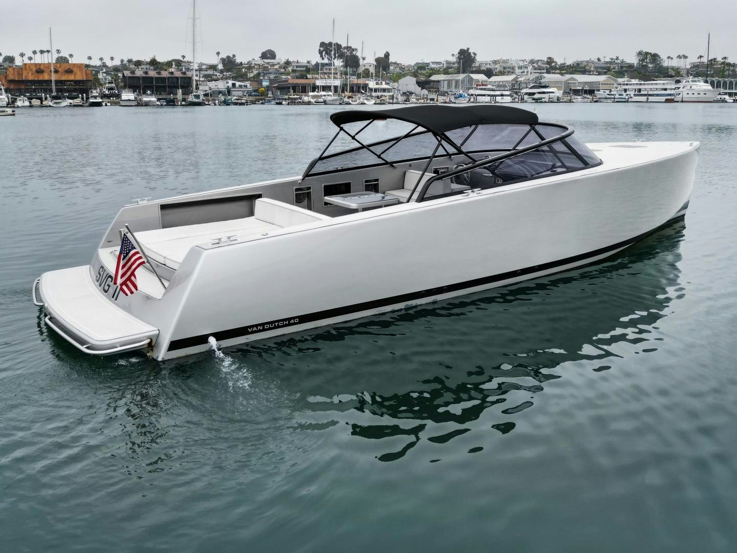 a white yacht in the water aboard SVG II Yacht for Sale
