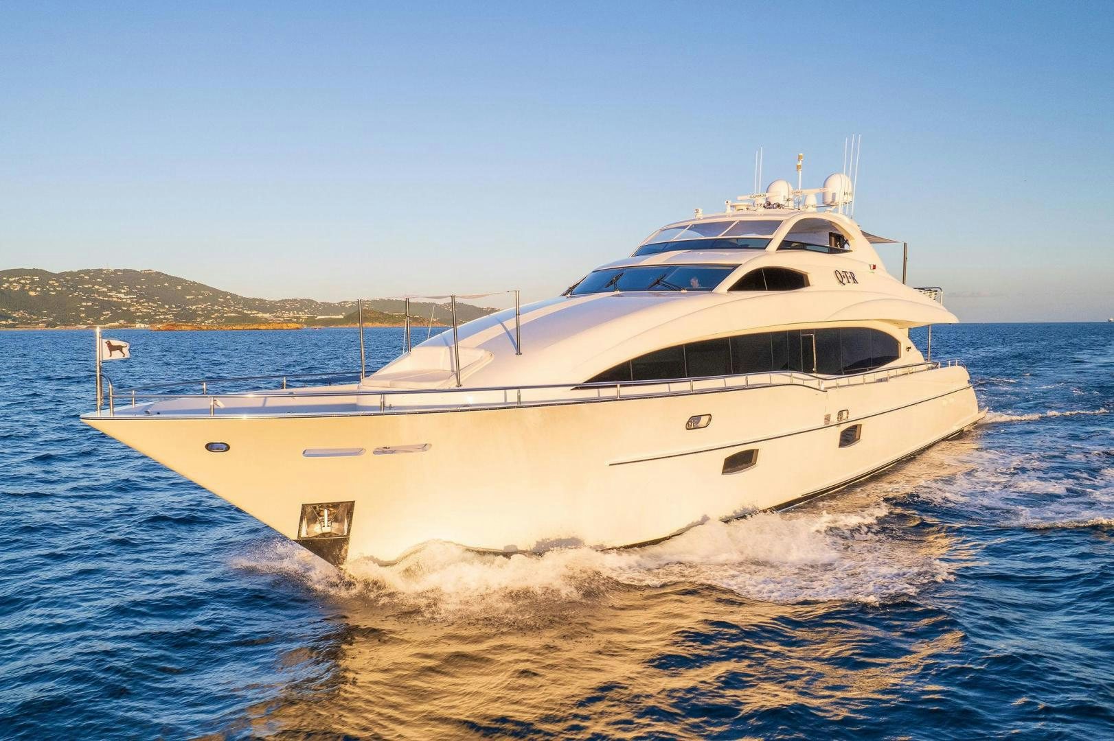 a white boat splashing in the water aboard NAMASTAY Yacht for Sale