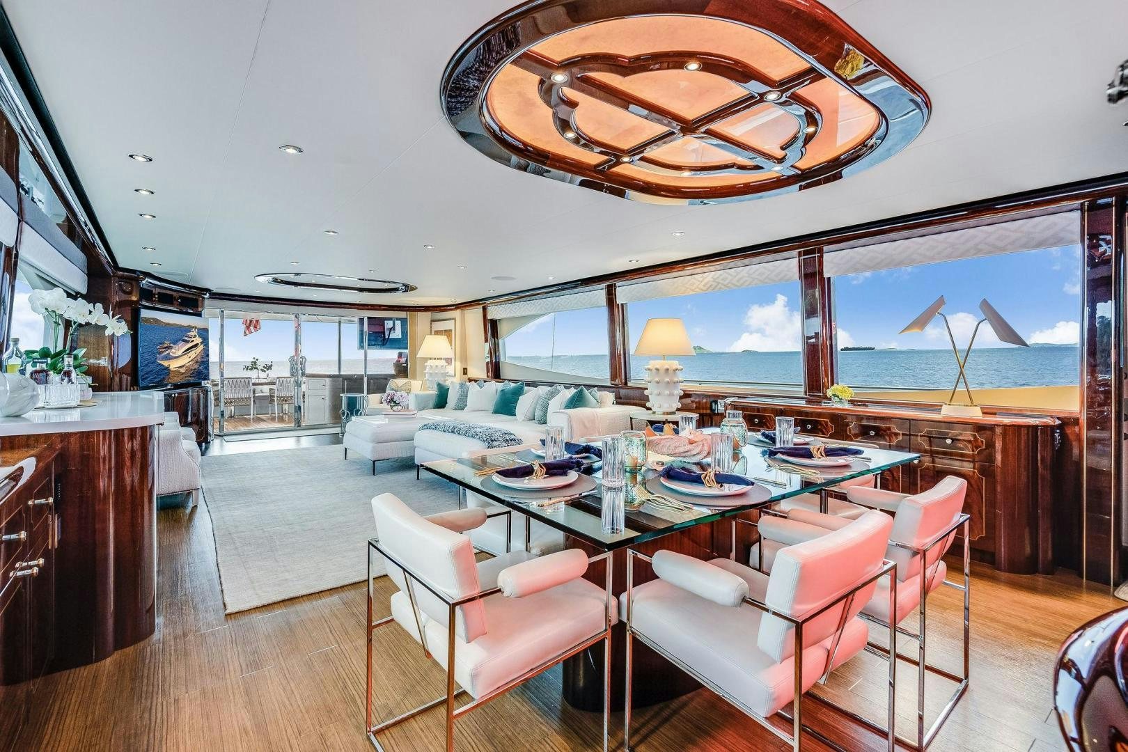 a large living room with a large open floor plan aboard NAMASTAY Yacht for Sale