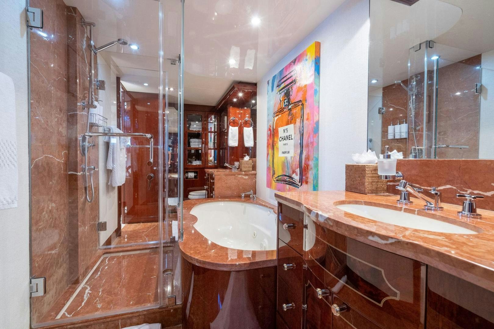 a bathroom with sinks and mirrors aboard NAMASTAY Yacht for Sale
