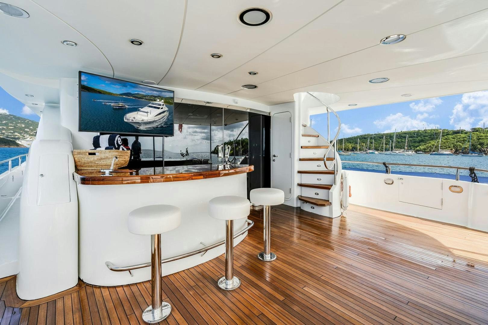 a kitchen with a large window aboard NAMASTAY Yacht for Sale