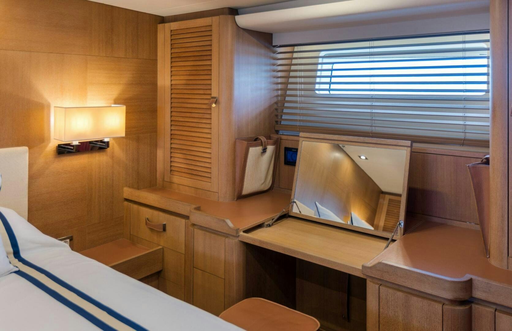 a room with a bed and a microwave aboard LEONARA Yacht for Sale