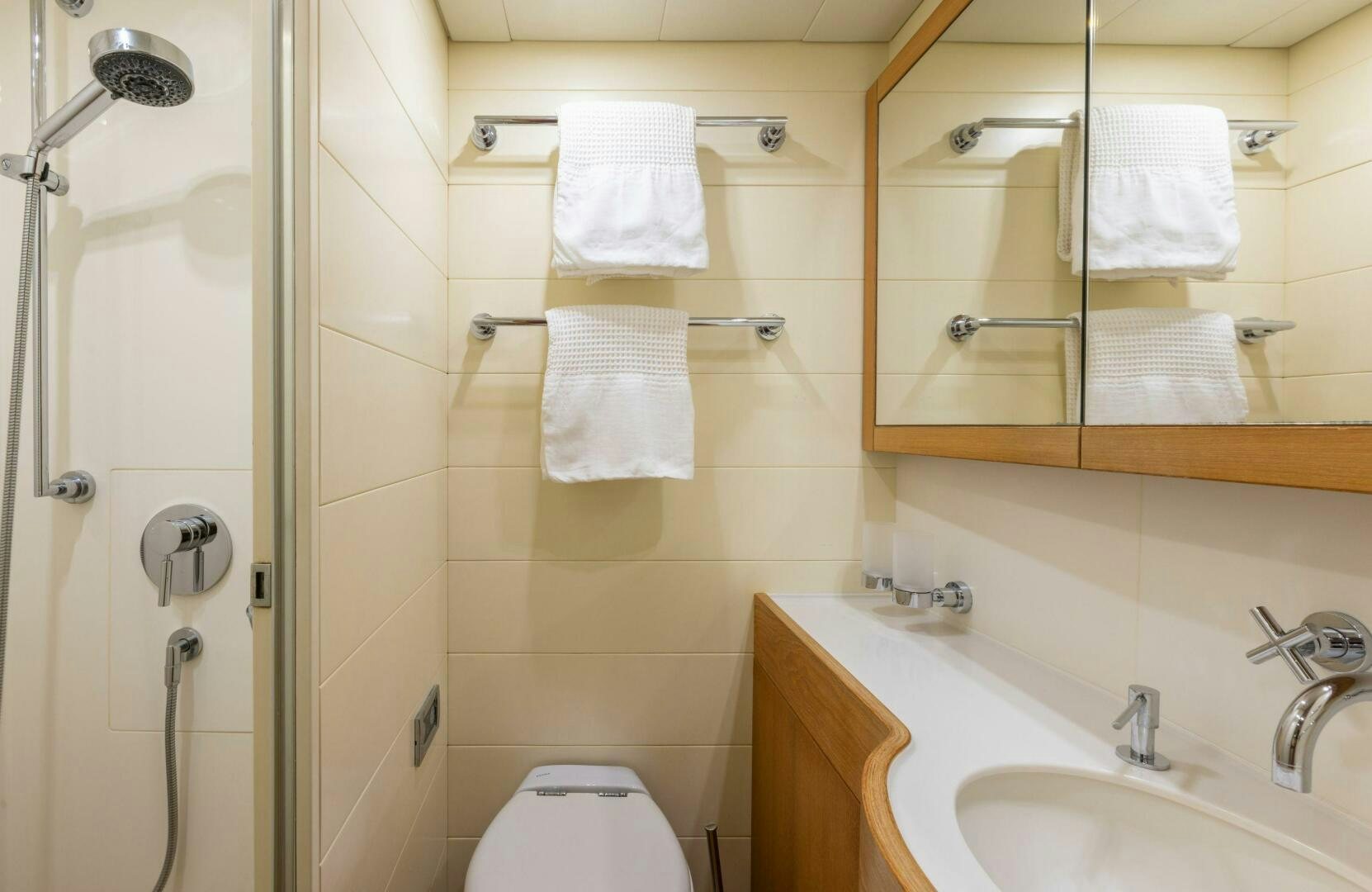 a bathroom with a sink and a shower aboard LEONARA Yacht for Sale