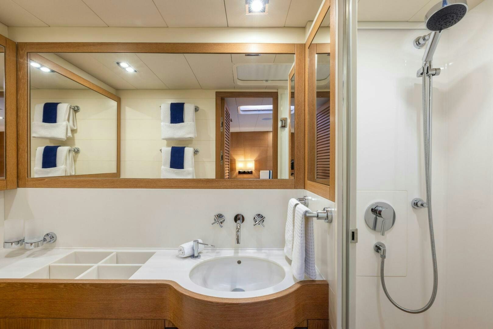 a bathroom with a sink and a shower aboard LEONARA Yacht for Sale