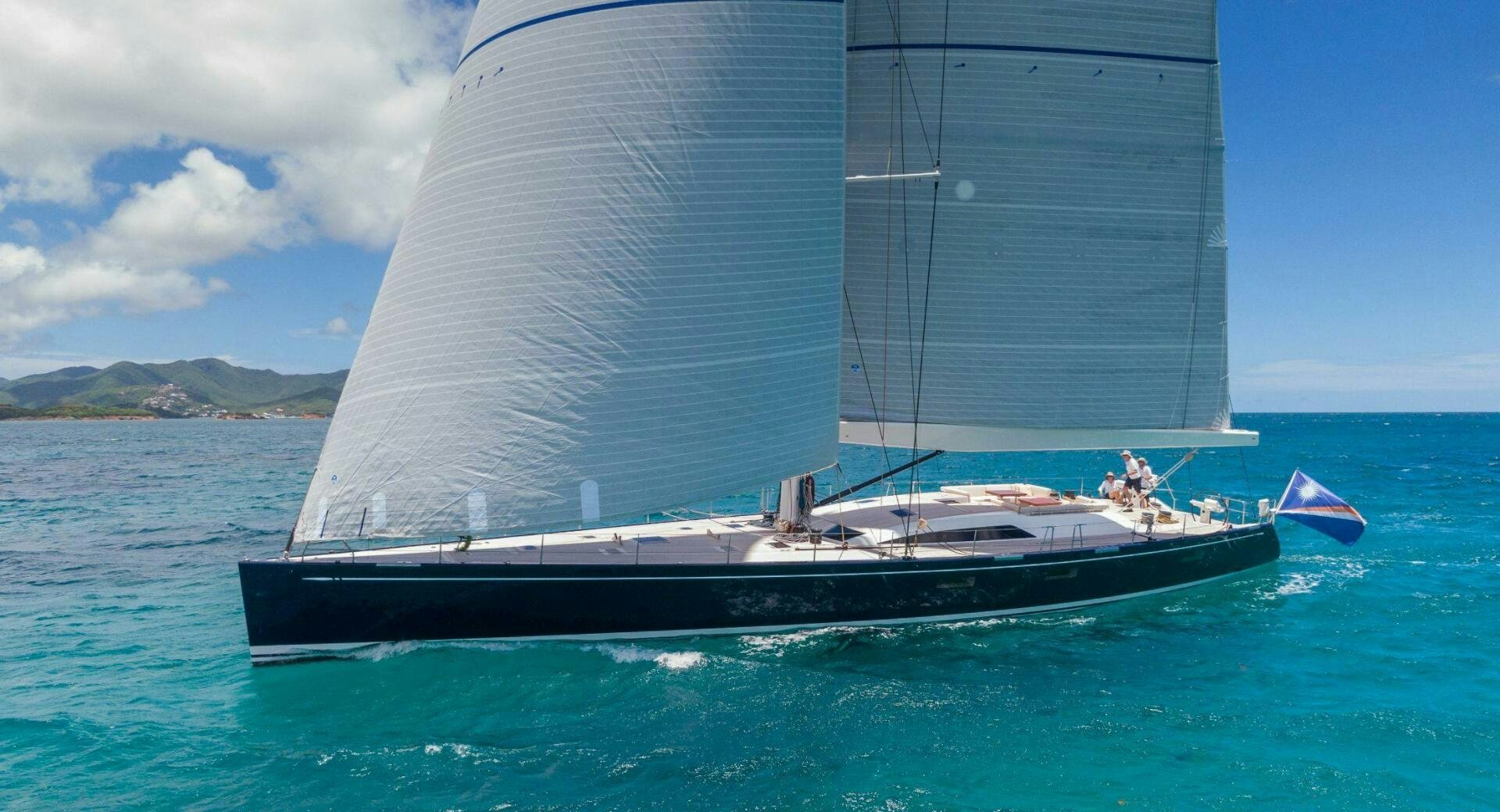 a boat with a large sail aboard LEONARA Yacht for Sale