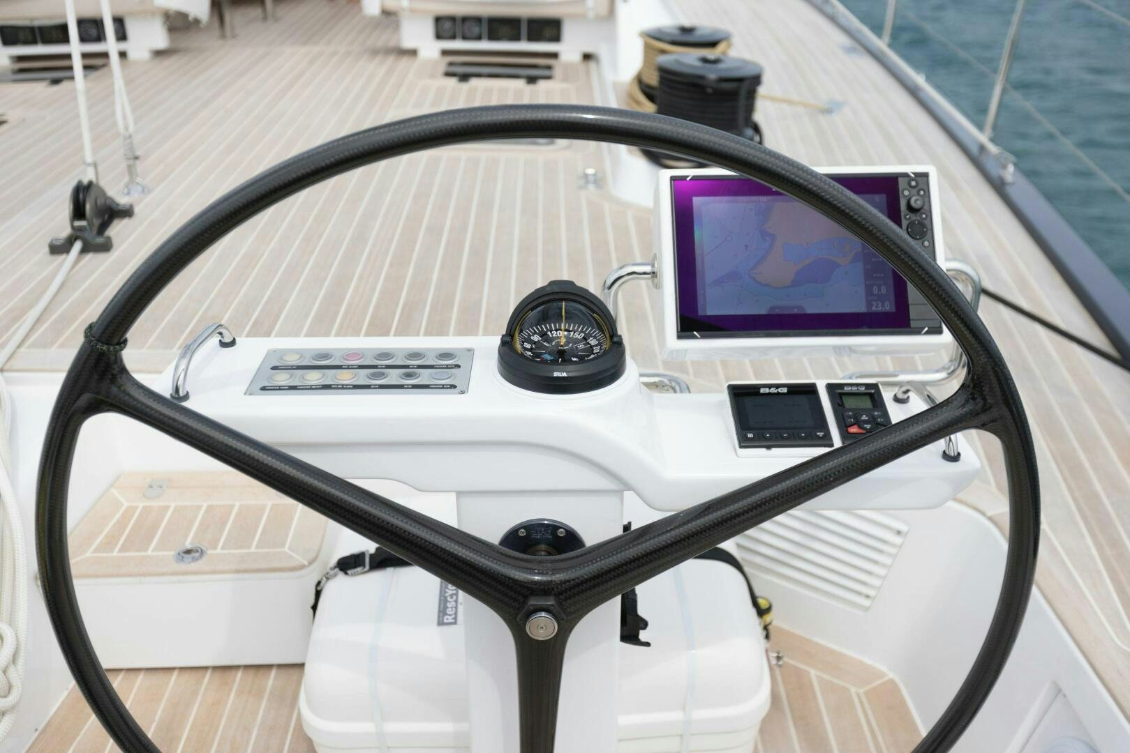a white boat with a screen aboard LEONARA Yacht for Sale