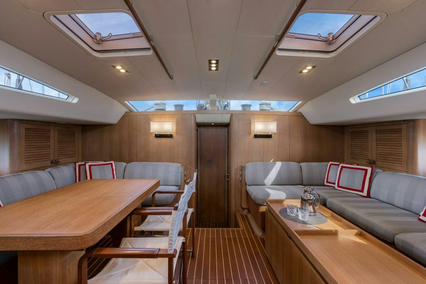 a room with a couch and a table aboard LEONARA Yacht for Sale