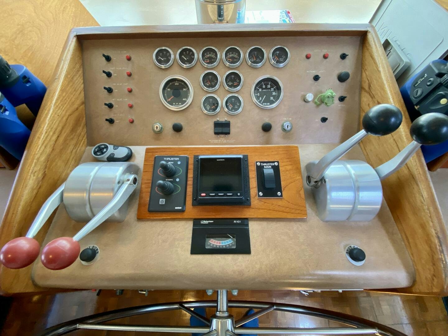 a wooden box with a group of buttons on it aboard CONUNDRUM Yacht for Sale