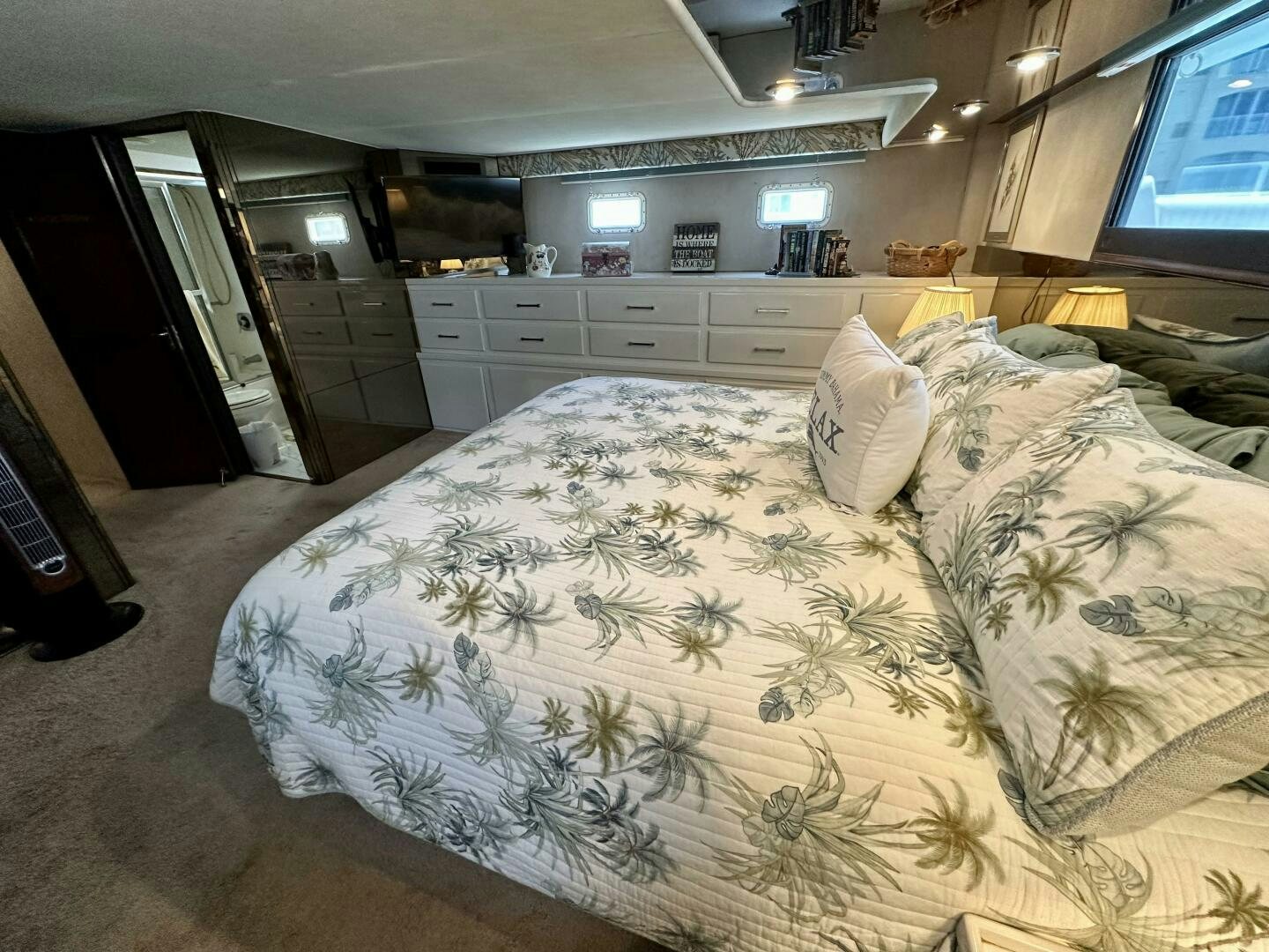 a large bed in a room aboard CONUNDRUM Yacht for Sale