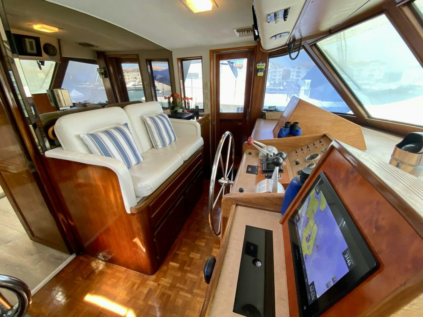 a room with a bed and a desk aboard CONUNDRUM Yacht for Sale