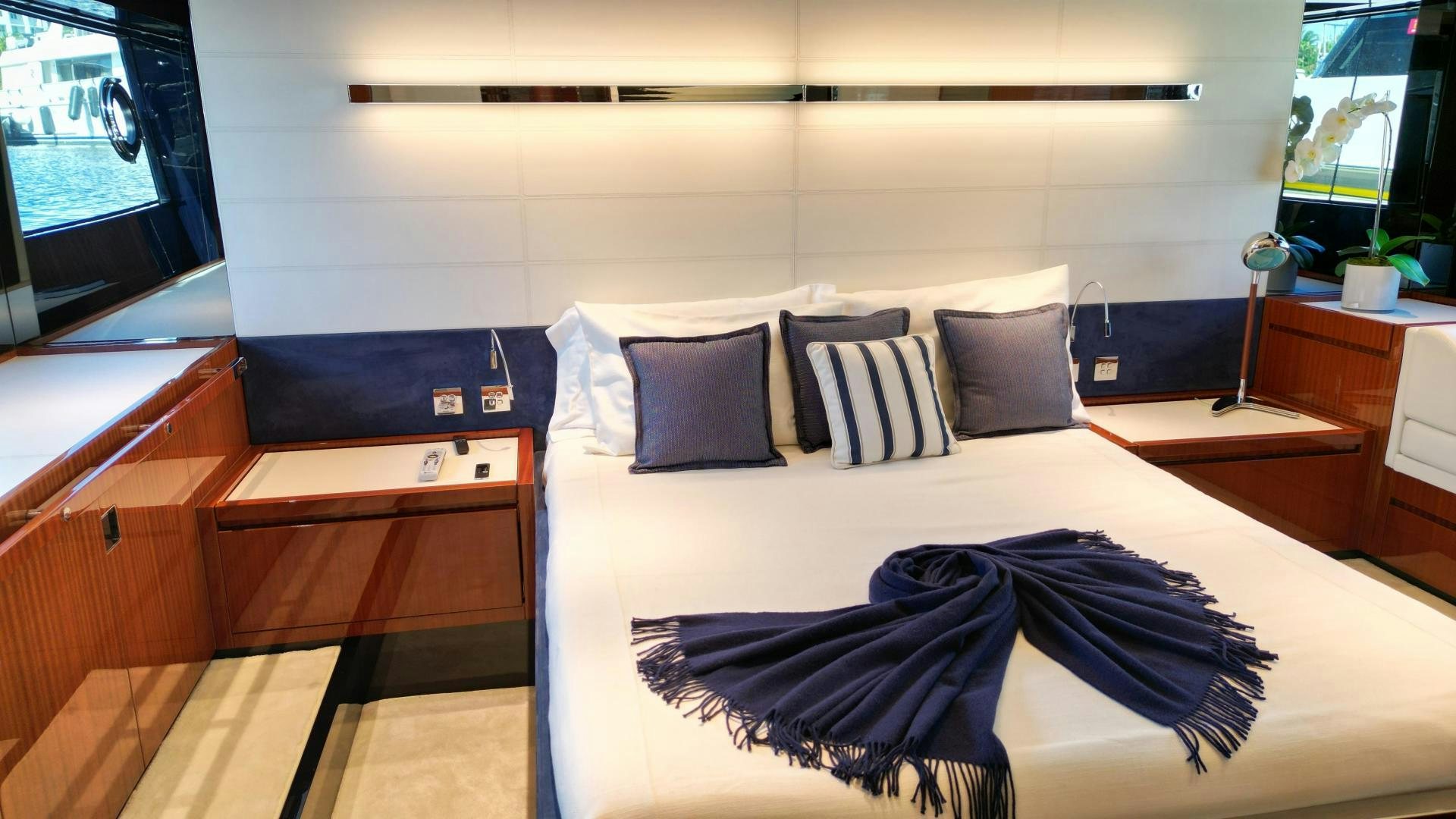 a bed with pillows aboard CAVALLO Yacht for Sale