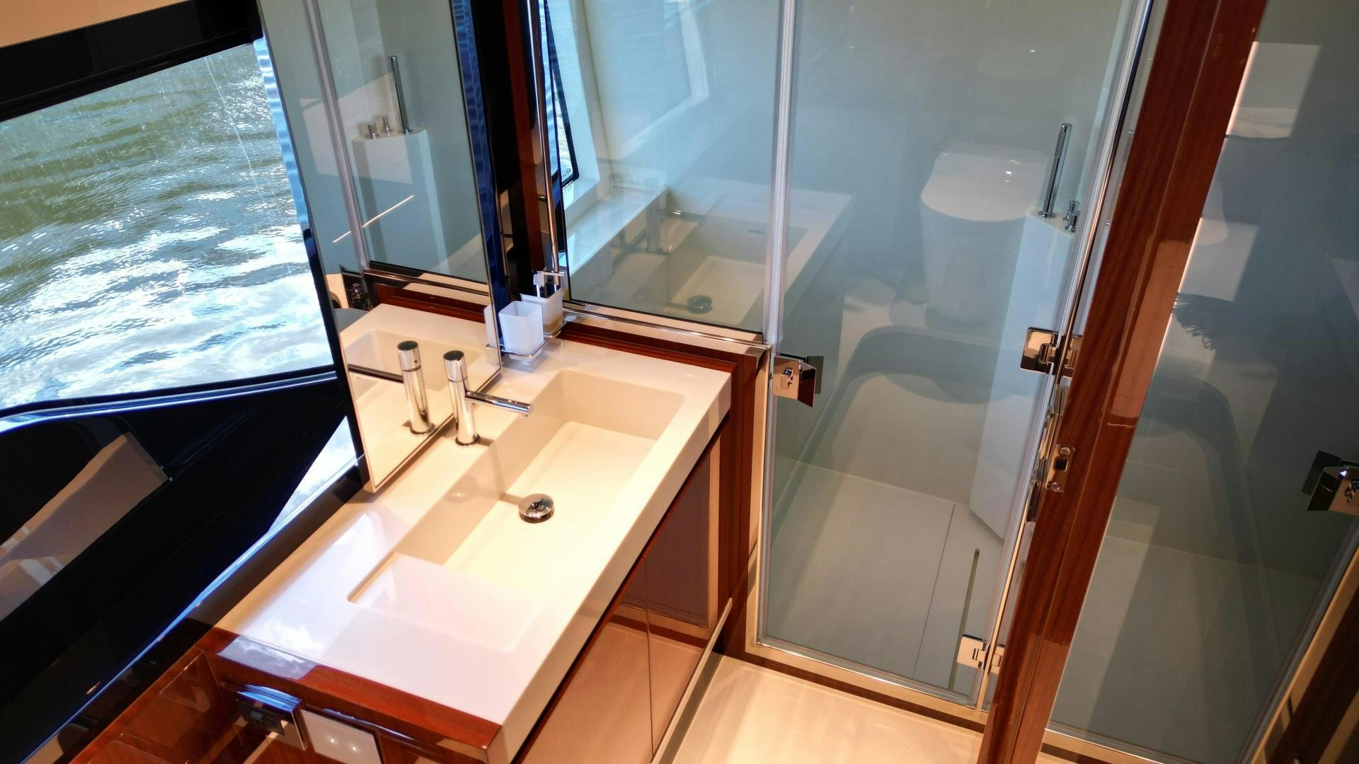 a bathroom with a sink and a shower aboard CAVALLO Yacht for Sale