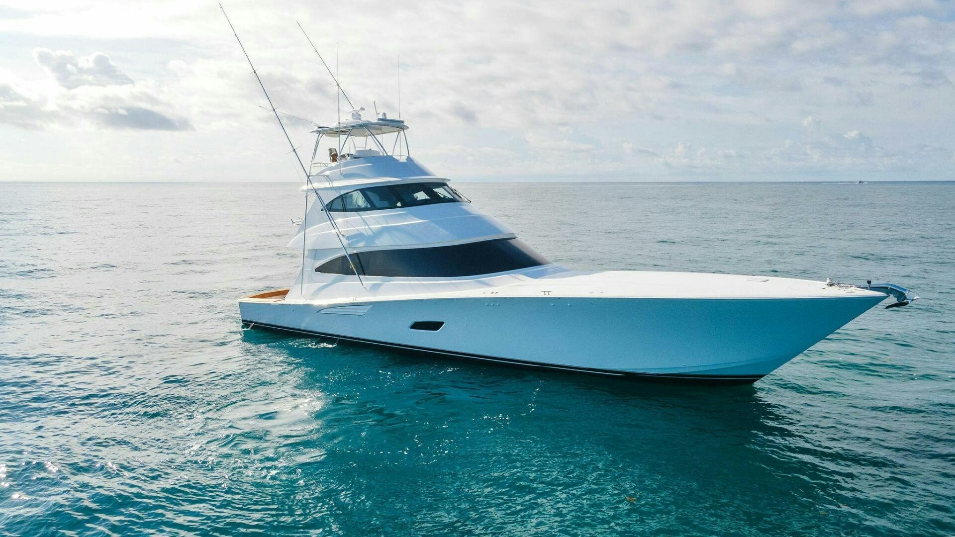 a white boat in the water aboard SHOE  Yacht for Sale