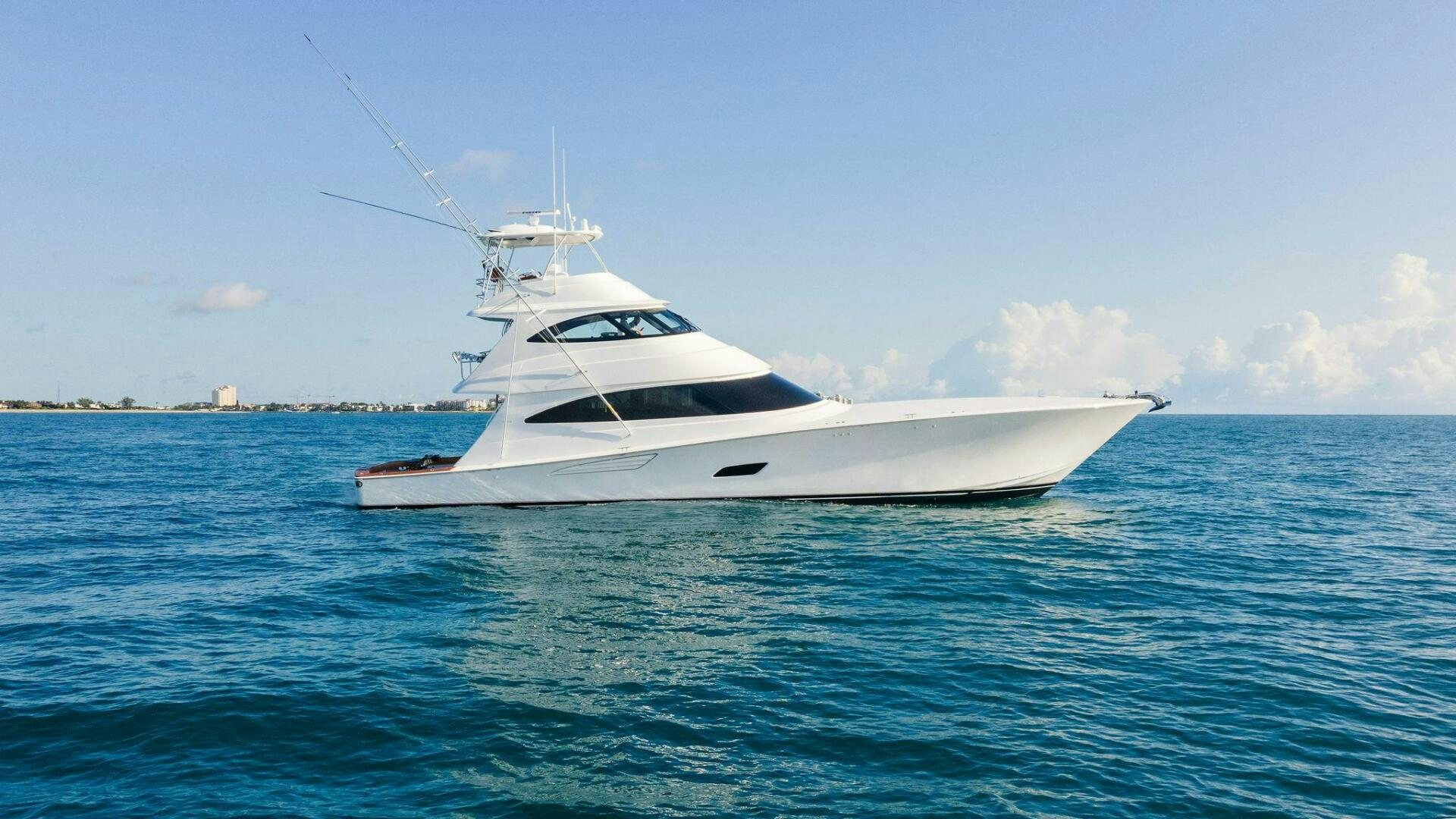 a white yacht in the water aboard SHOE  Yacht for Sale