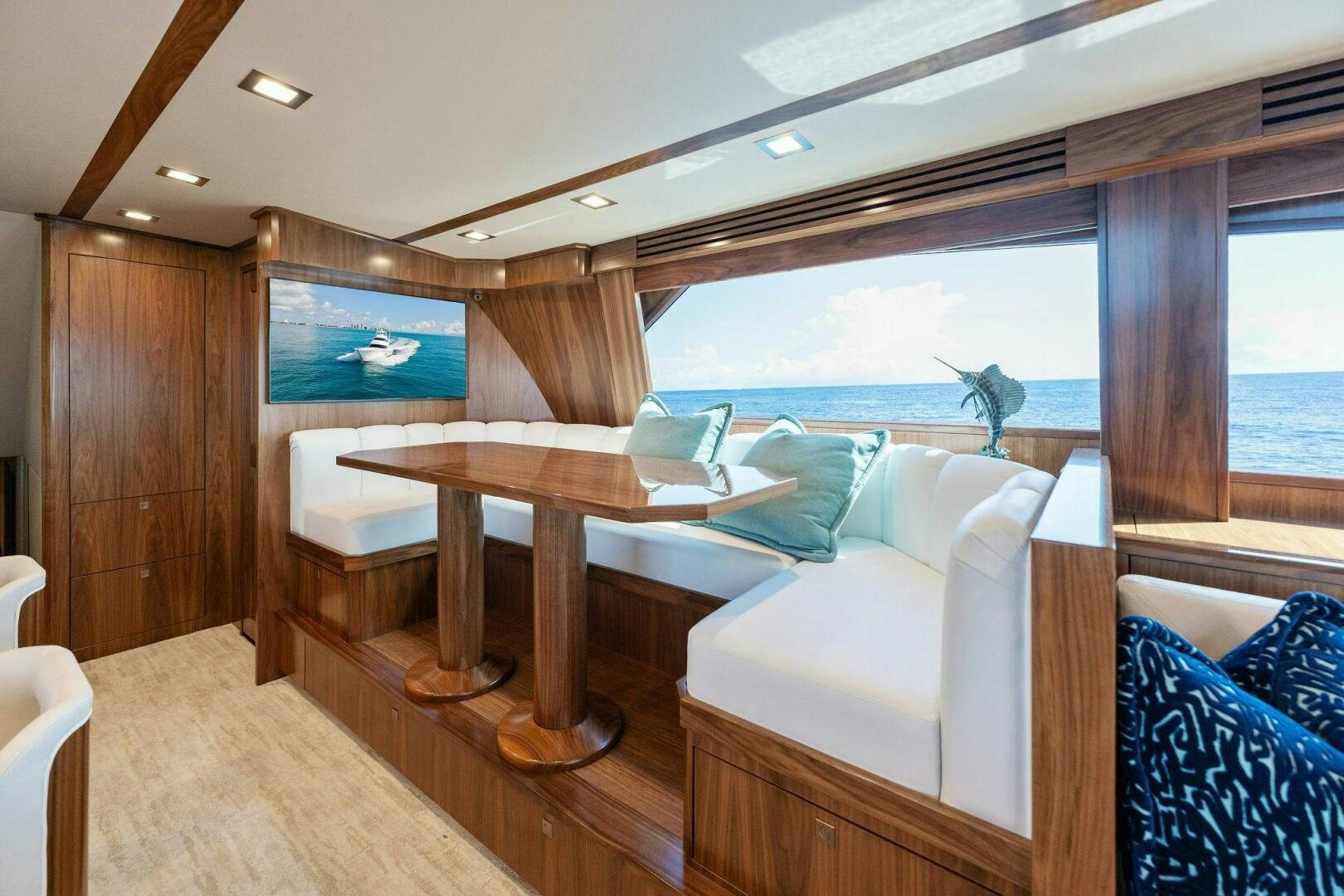 a room with a table and chairs aboard SHOE  Yacht for Sale