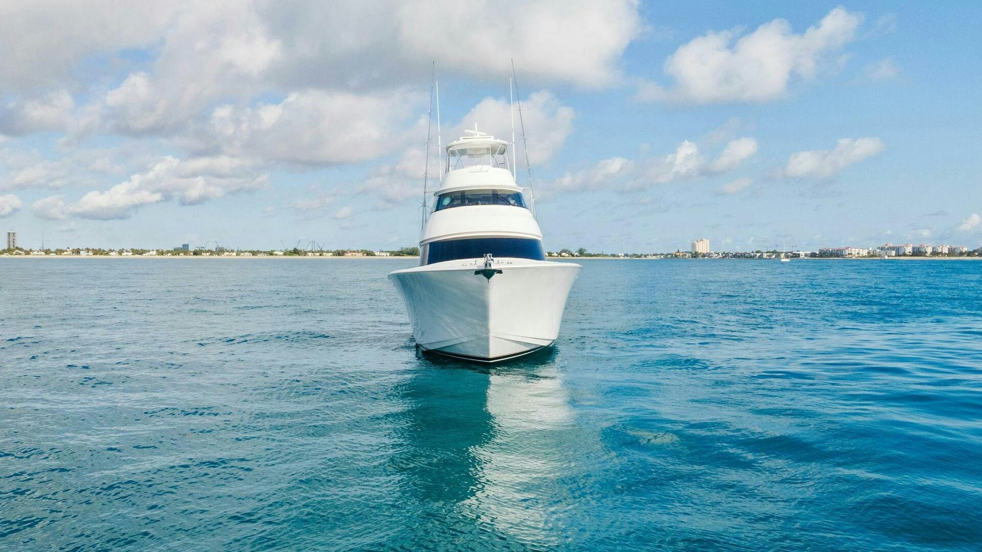a white boat in the water aboard SHOE  Yacht for Sale