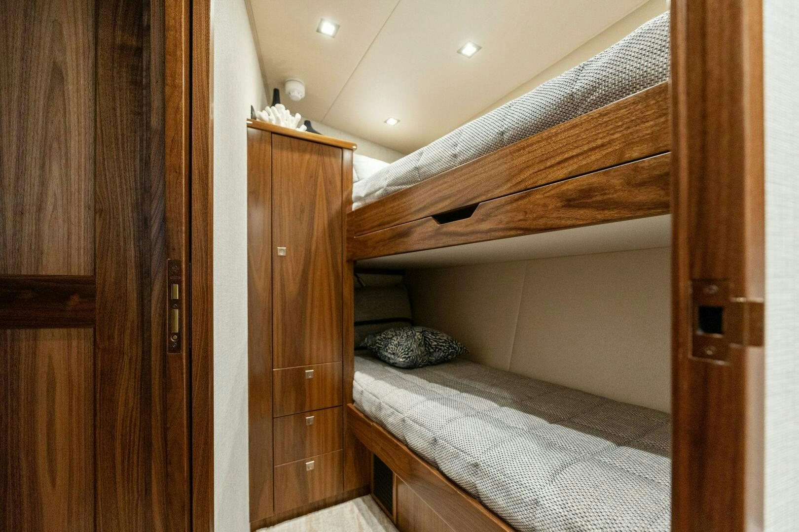 a room with a bed and a closet aboard SHOE  Yacht for Sale