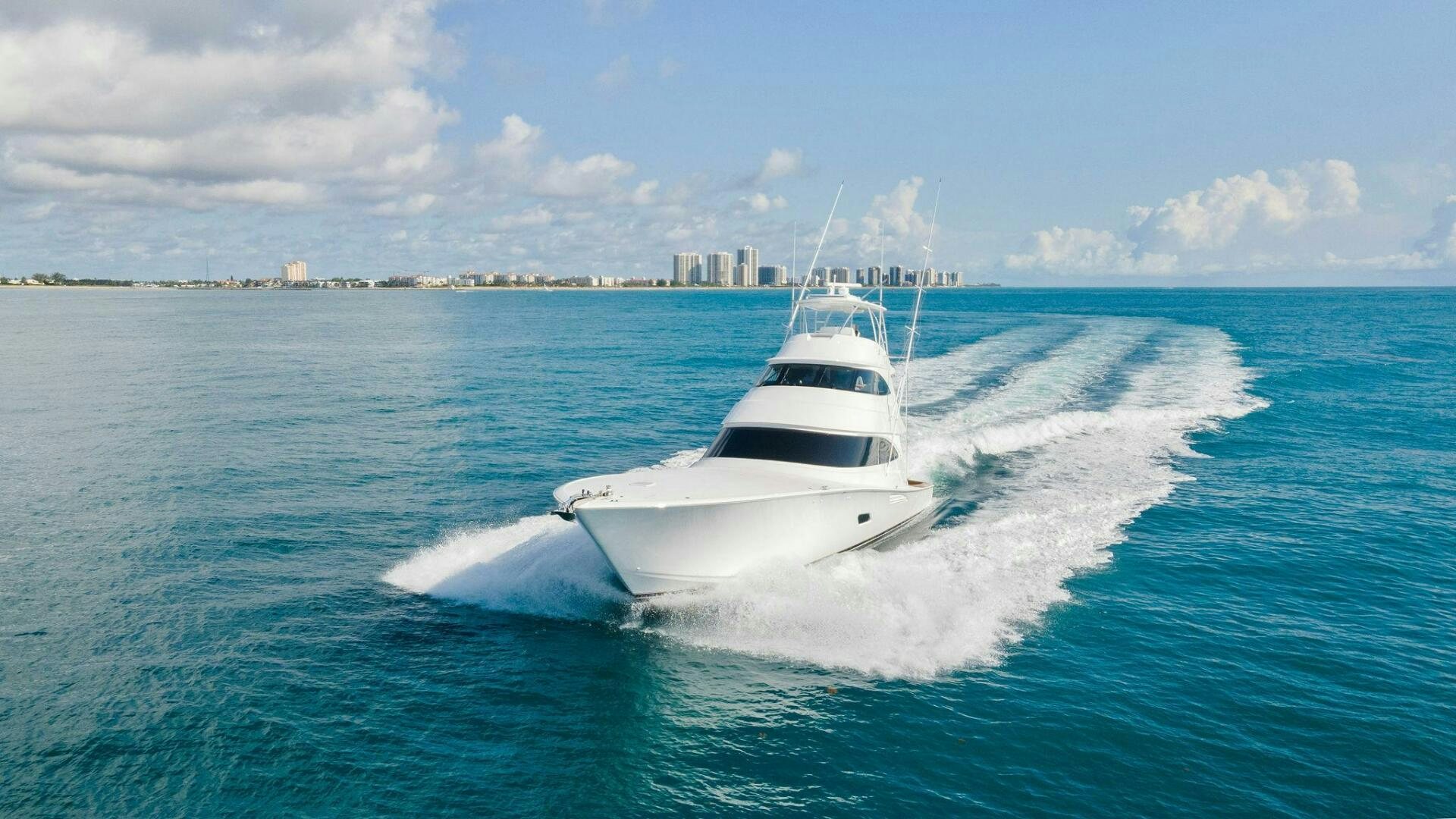 a white yacht on the water aboard SHOE  Yacht for Sale
