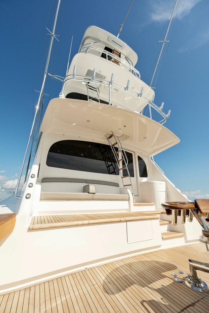 a white boat on a deck aboard SHOE  Yacht for Sale