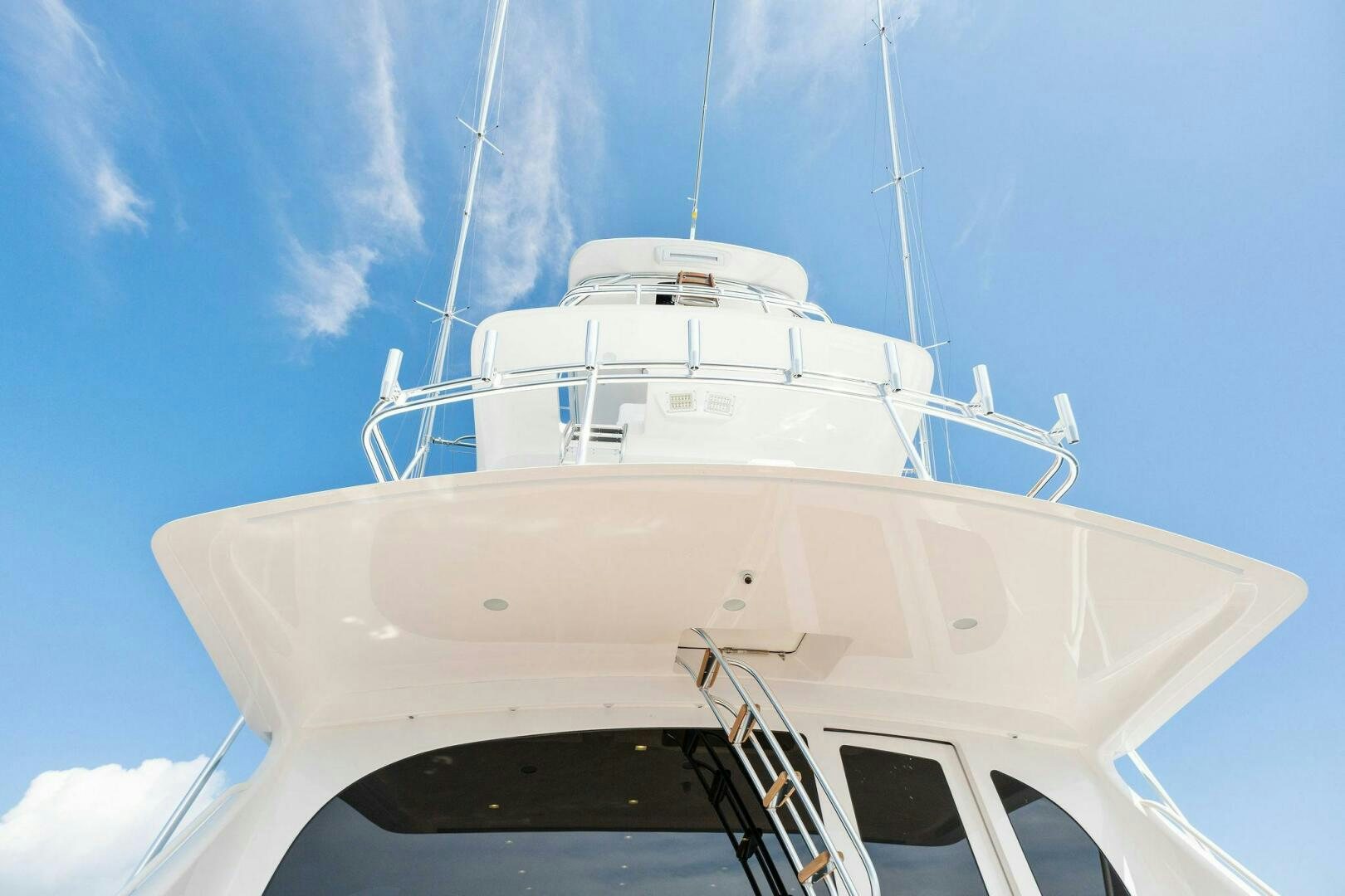 a white boat on a white surface aboard SHOE  Yacht for Sale