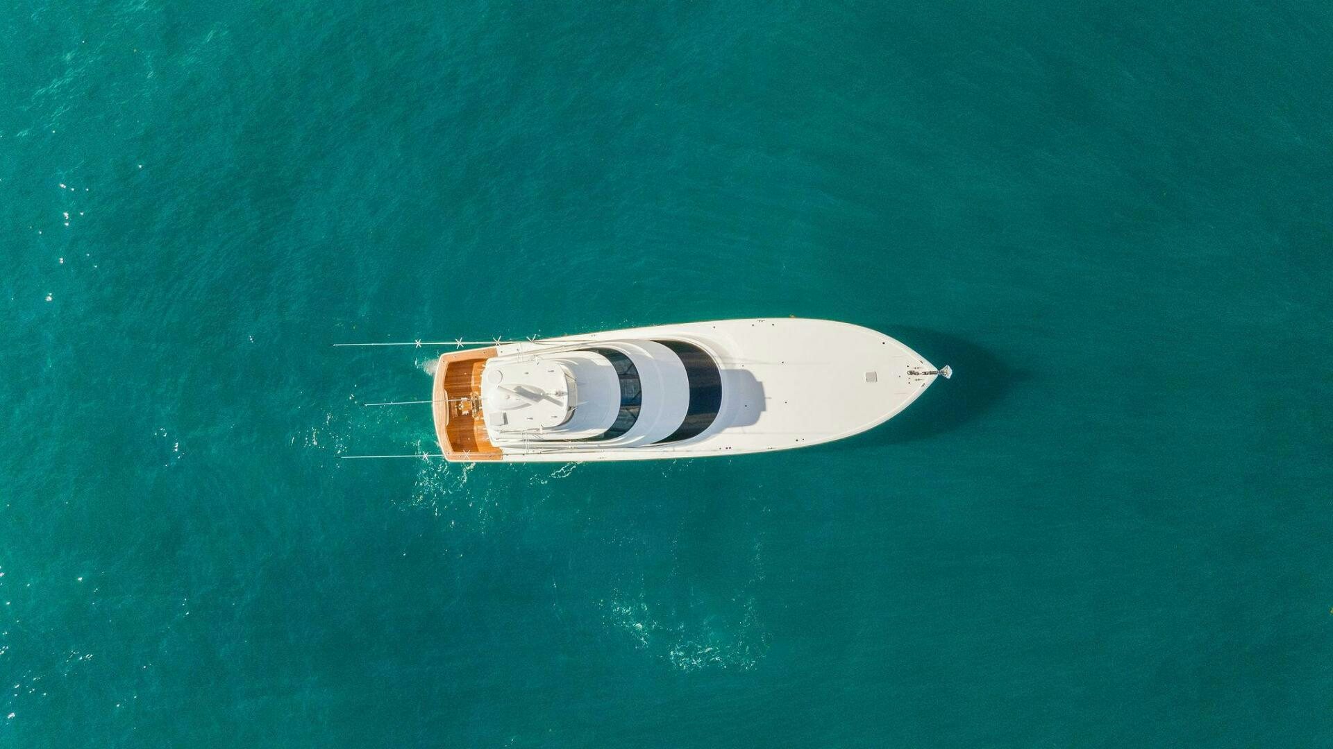a can of beer on a green surface aboard SHOE  Yacht for Sale