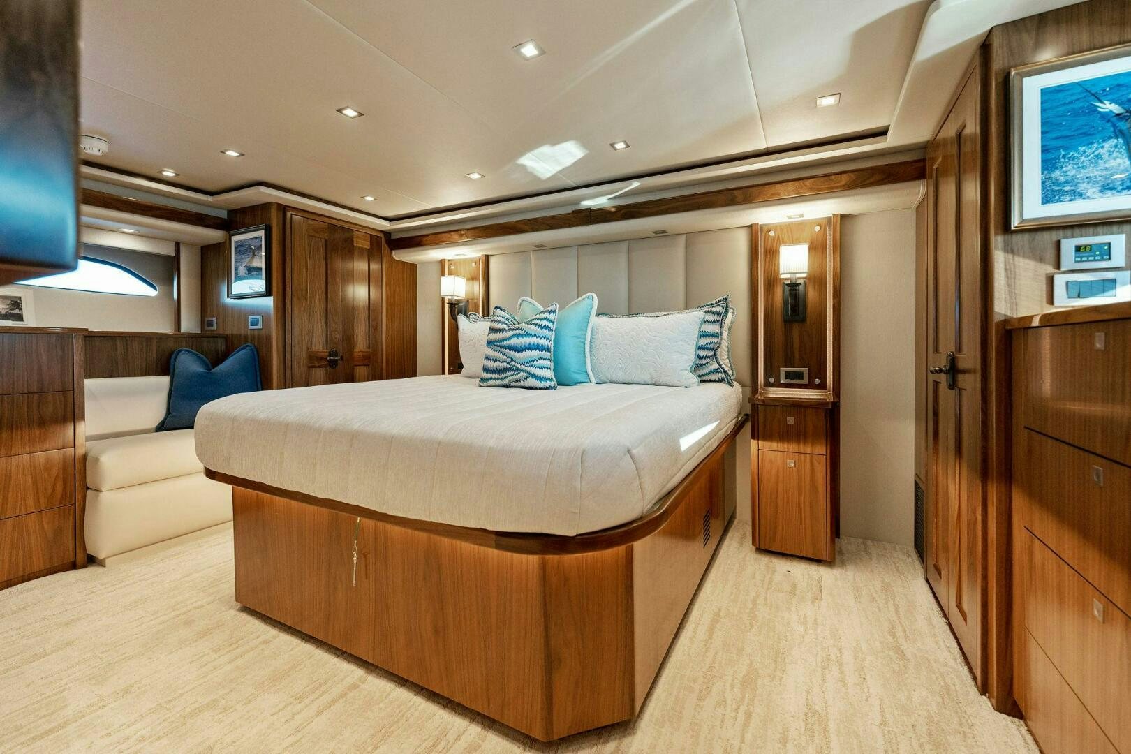 a room with a bed and a couch aboard SHOE  Yacht for Sale