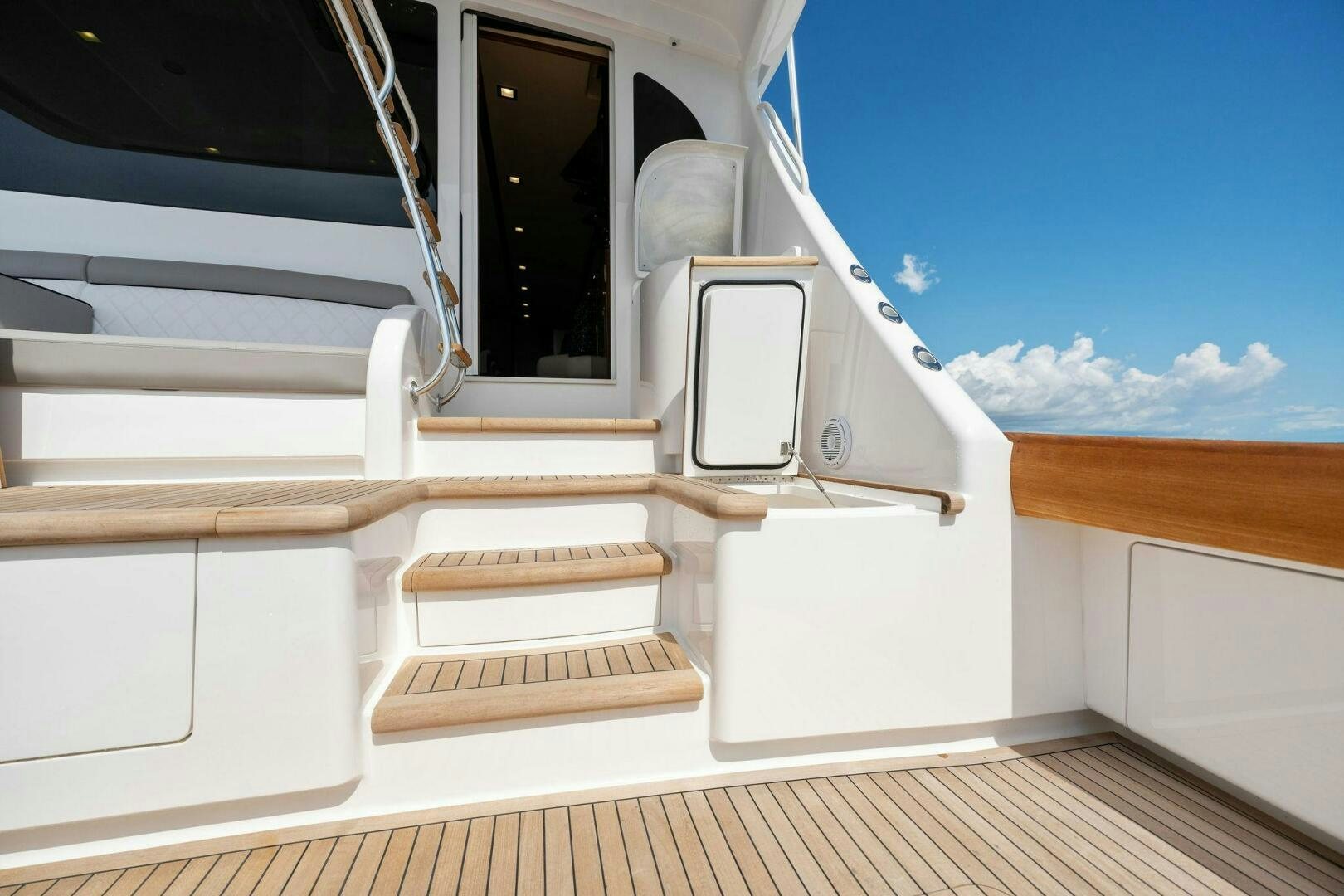 a white boat on a deck aboard SHOE  Yacht for Sale