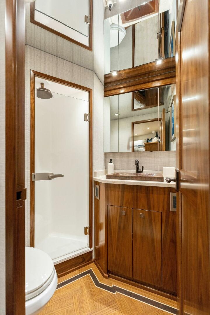 a bathroom with a sink and a toilet aboard SHOE  Yacht for Sale