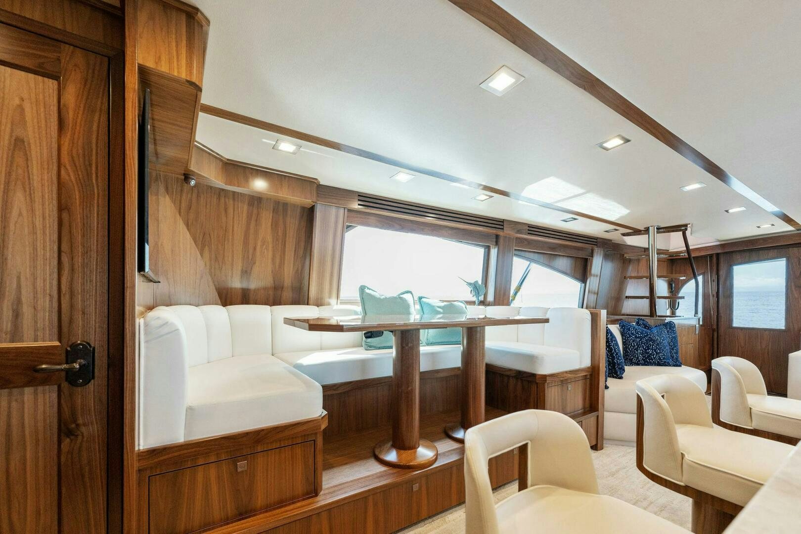 a room with a table and chairs aboard SHOE  Yacht for Sale
