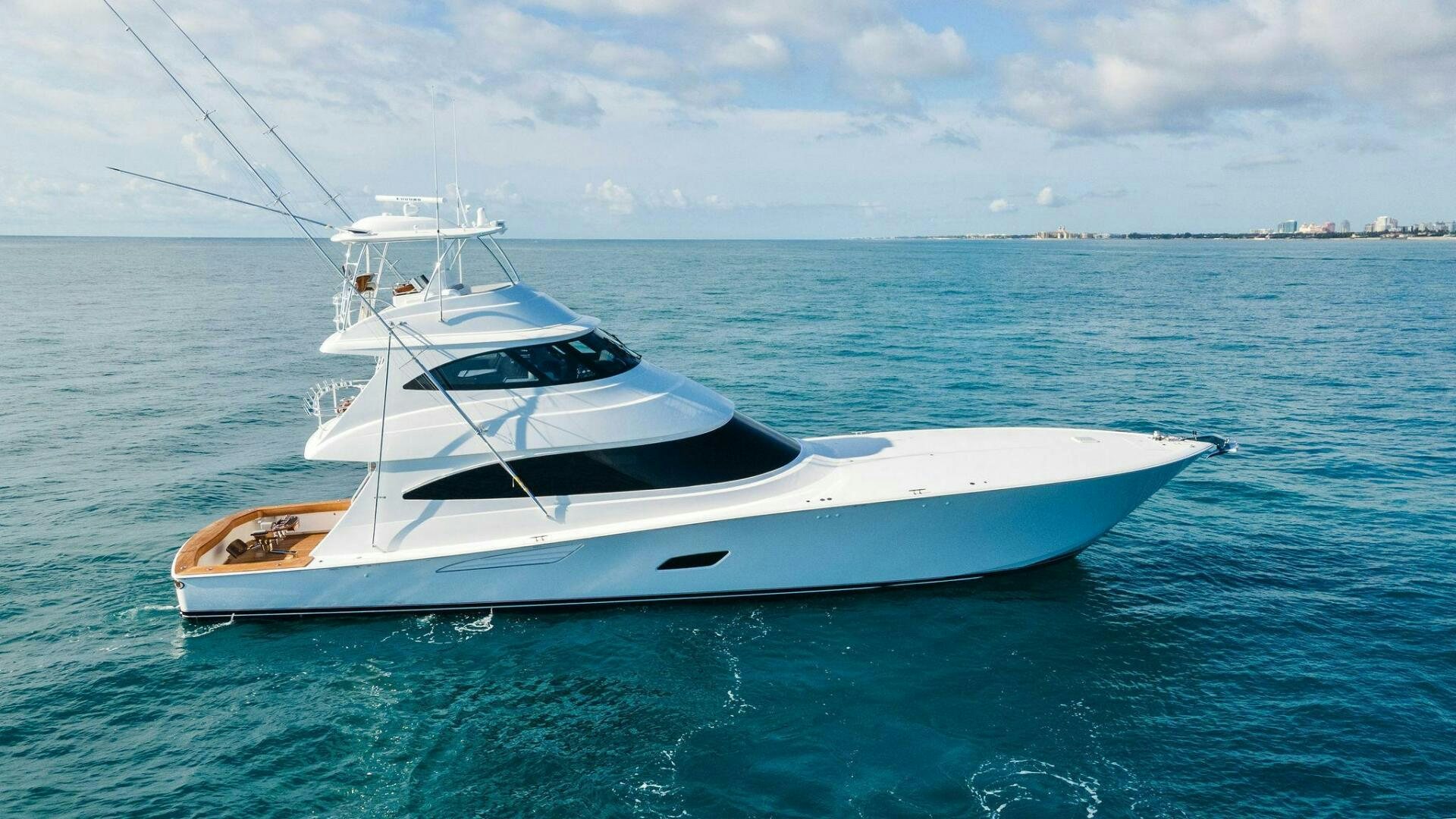 a white yacht in the water aboard SHOE  Yacht for Sale