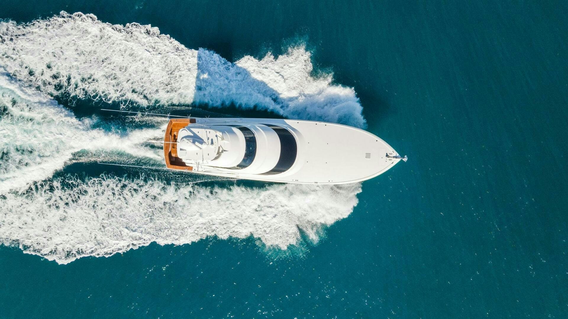 a person in a speed boat aboard SHOE  Yacht for Sale