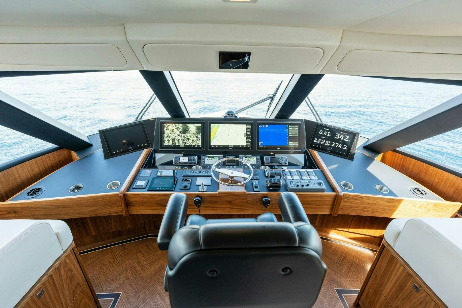 a desk with a chair and a computer on it aboard SHOE  Yacht for Sale