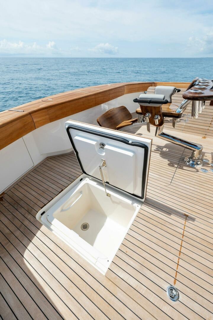 a white rectangular object on a deck overlooking the ocean aboard SHOE  Yacht for Sale