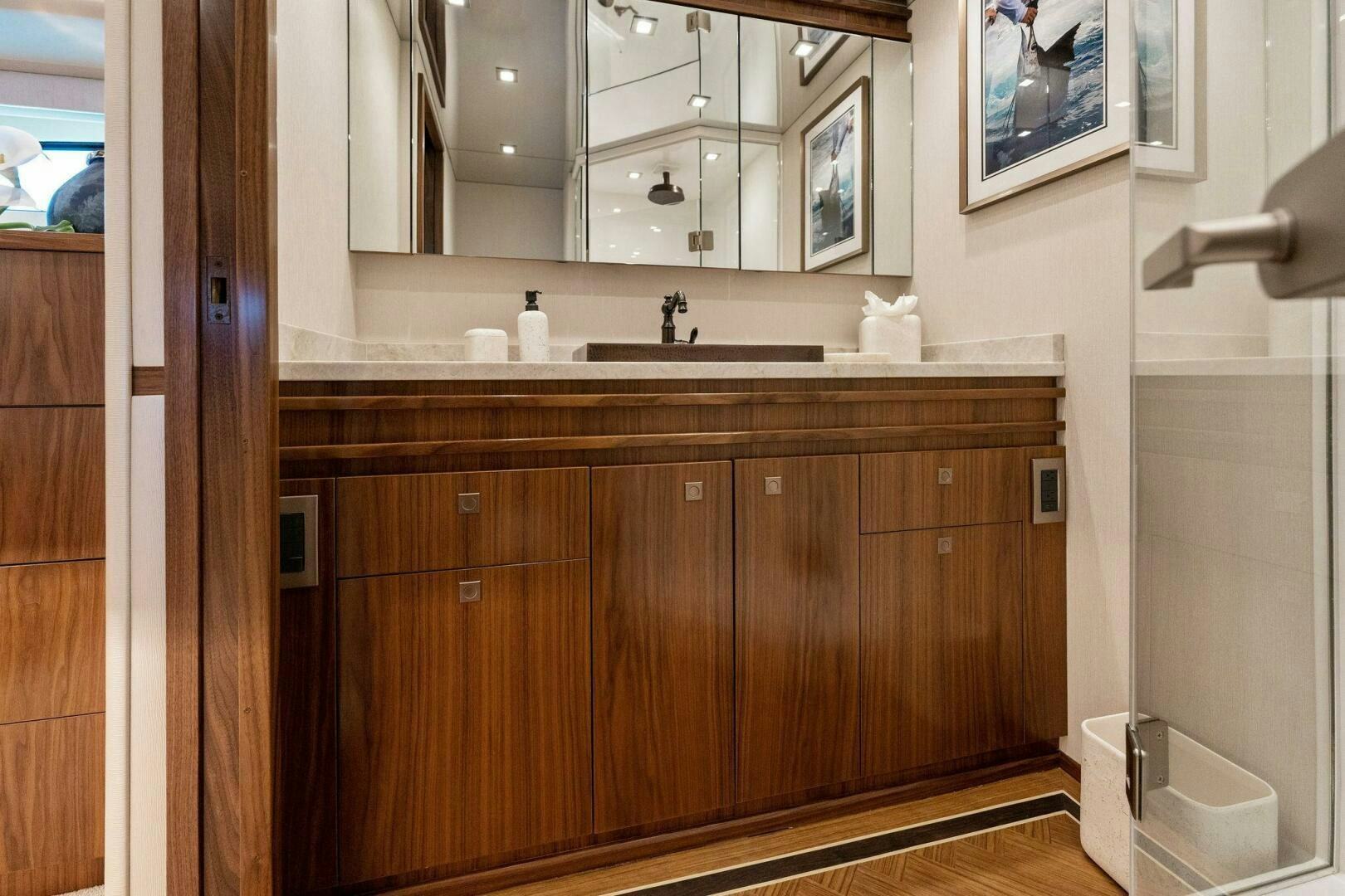 a bathroom with wooden cabinets aboard SHOE  Yacht for Sale