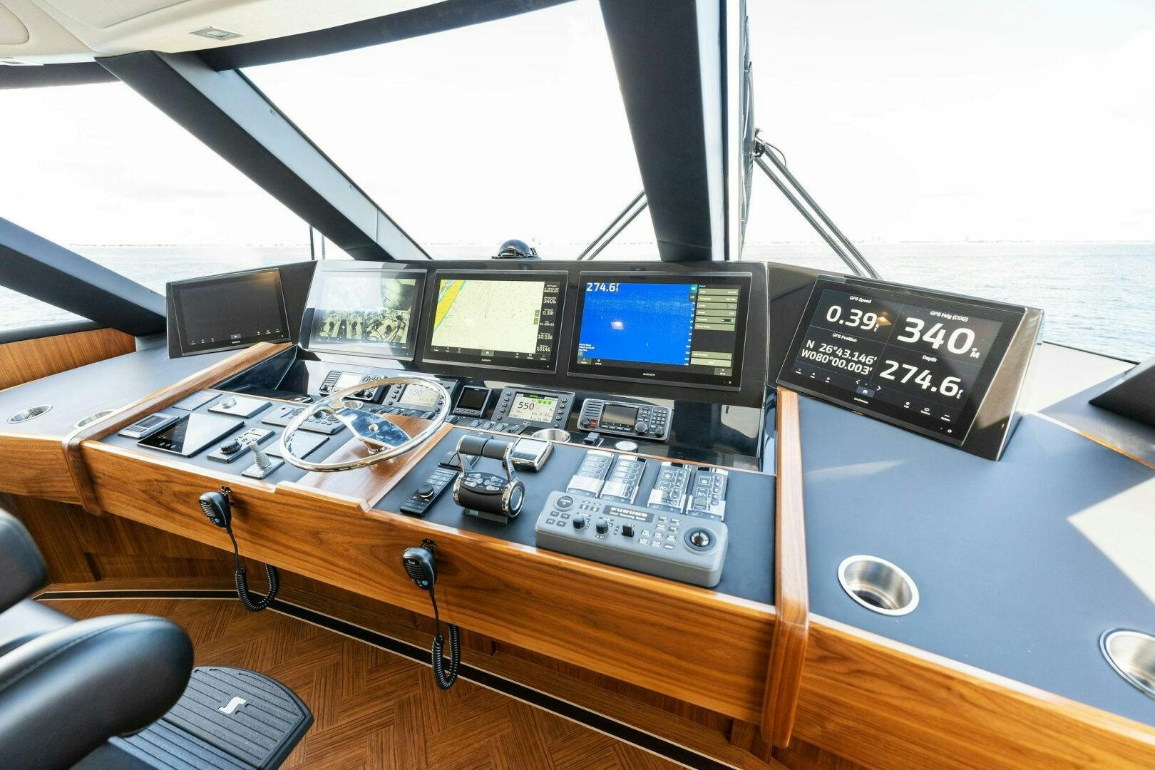 a desk with a computer and other electronic devices on it aboard SHOE  Yacht for Sale
