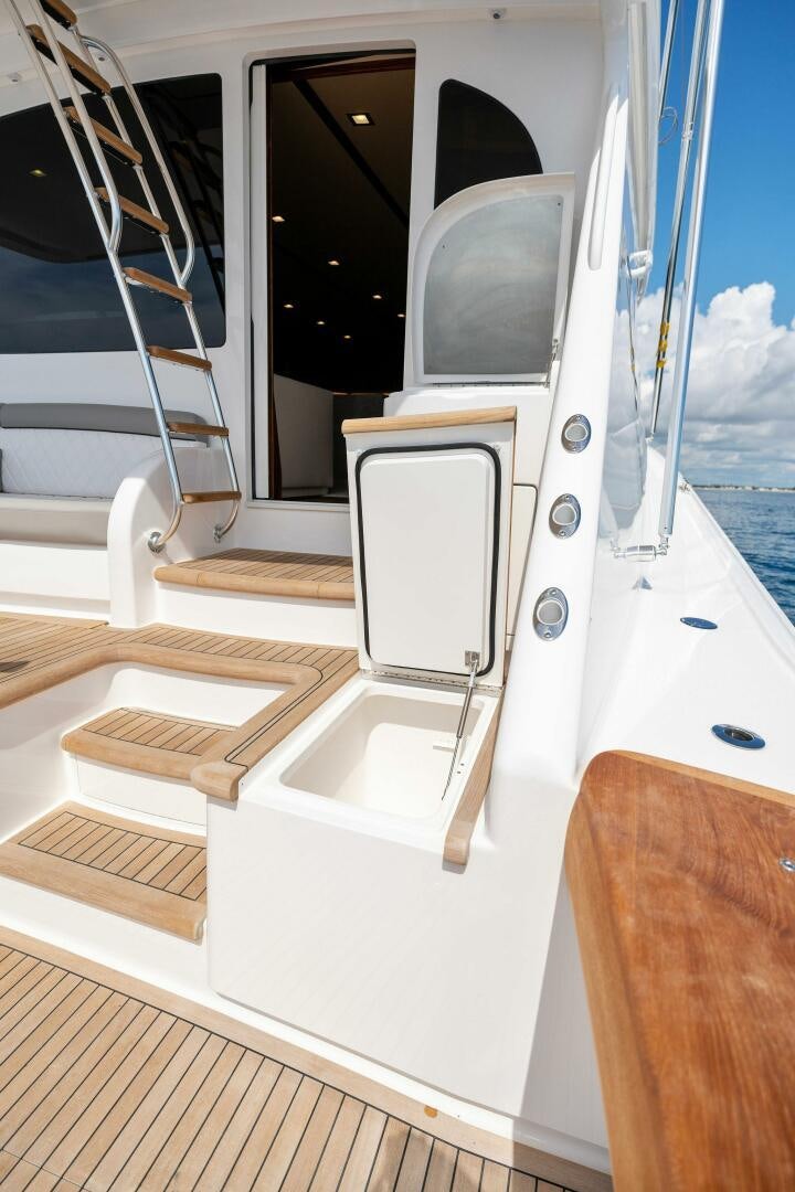 a boat with a screen aboard SHOE  Yacht for Sale