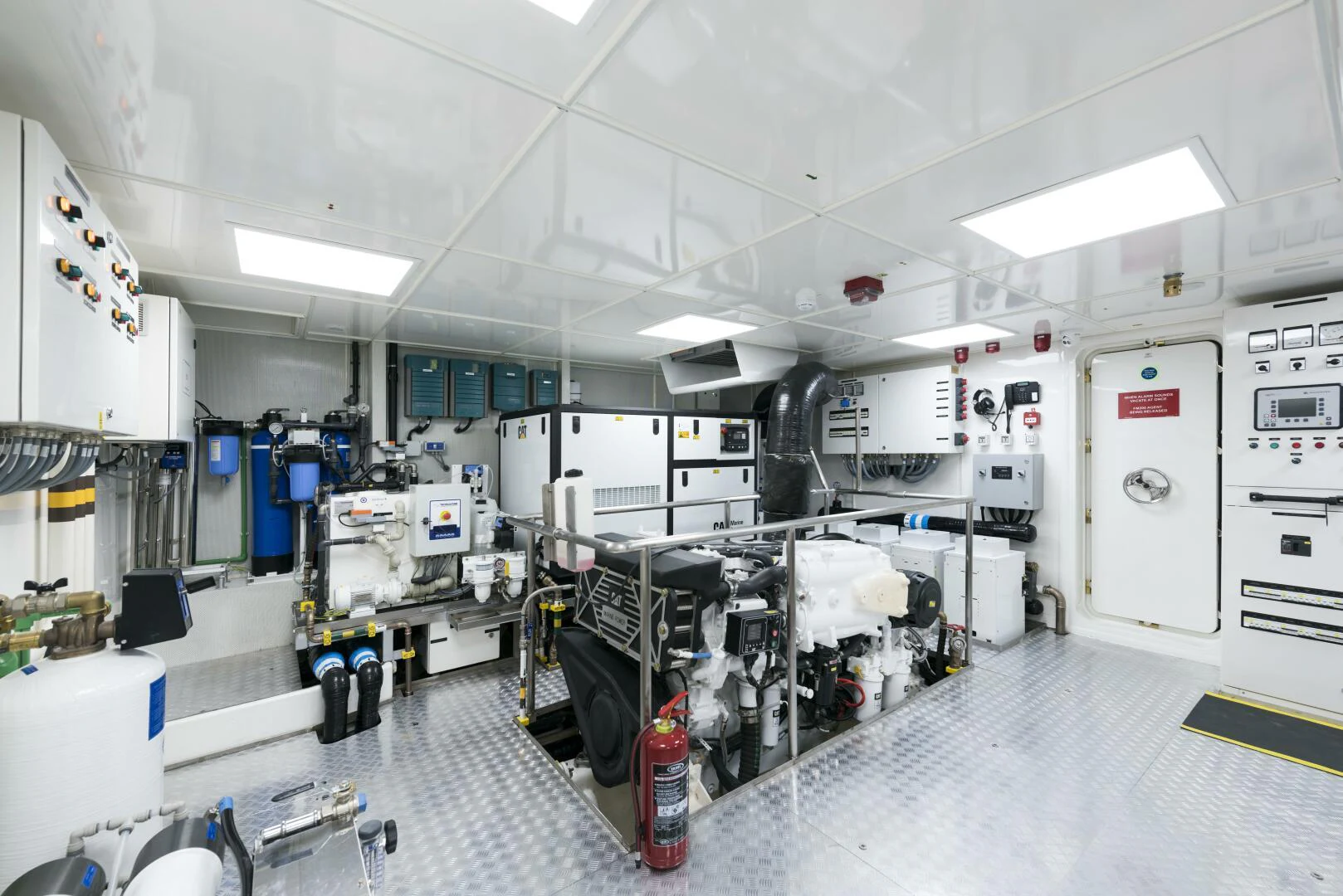 a room with machines and equipment aboard PICCOLO Yacht for Sale