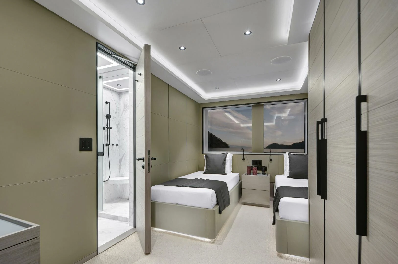 a room with a bed and a desk aboard PICCOLO Yacht for Sale